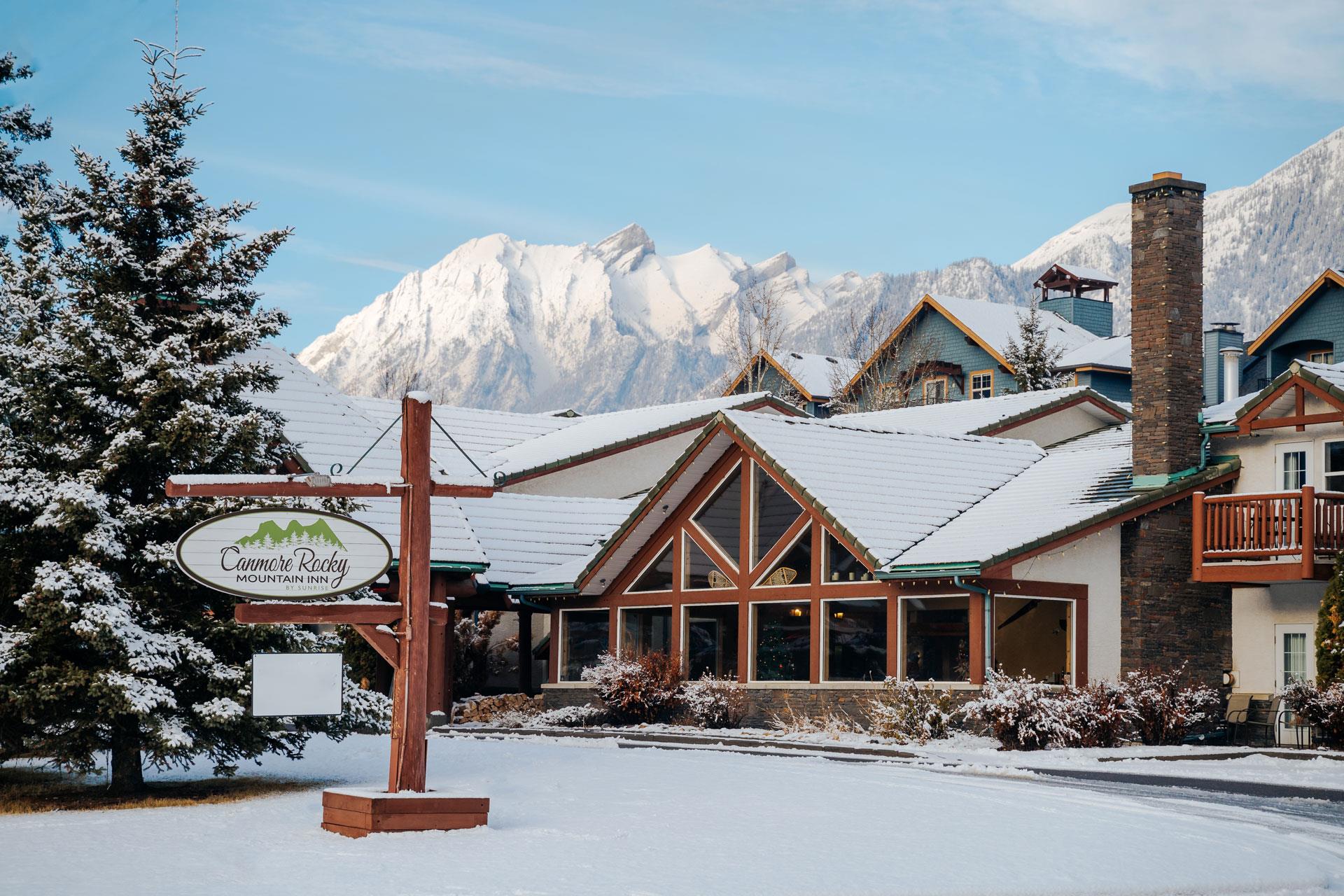 canmore rocky mountain inn, hotel in Canmore AB header background
